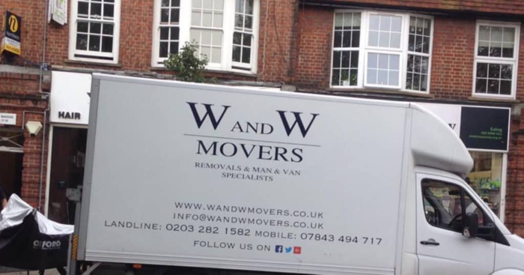 WandW Movers van in front of the house